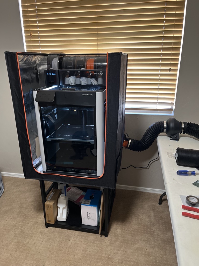 Michael's Bambu Lab H2D and recent prints — desiccant holders, D&D terrain pieces, Fellowship weapon work-in-progress